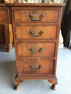 Lot 19 - Georgian style mahogany twin pedestal desk with tooled red leather top and nine drawers on cabriole feet