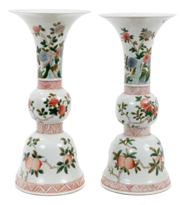 Lot 152 - Pair Chinese porcelain altar gu vases, 19th/20th century, decorated in famille verte enamels with fruit, flowers and butterflies , 23.5cm height