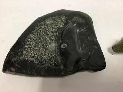 Lot 588 - Two carved green hardstone models, possibly Inuit, one of a polar bear and one of a seal on ice, both 17cm across