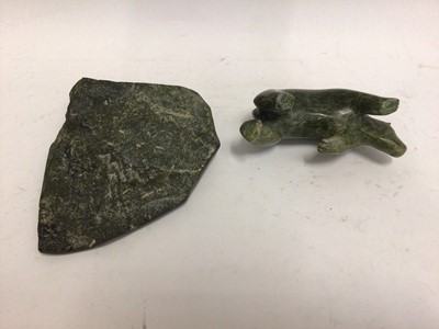 Lot 588 - Two carved green hardstone models, possibly Inuit, one of a polar bear and one of a seal on ice, both 17cm across