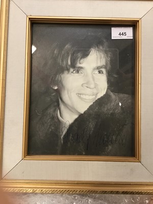 Lot 445 - Rudolf Nureyev- signed portrait photograph in glazed frame and a pastel portrait of him by D.M.Corby