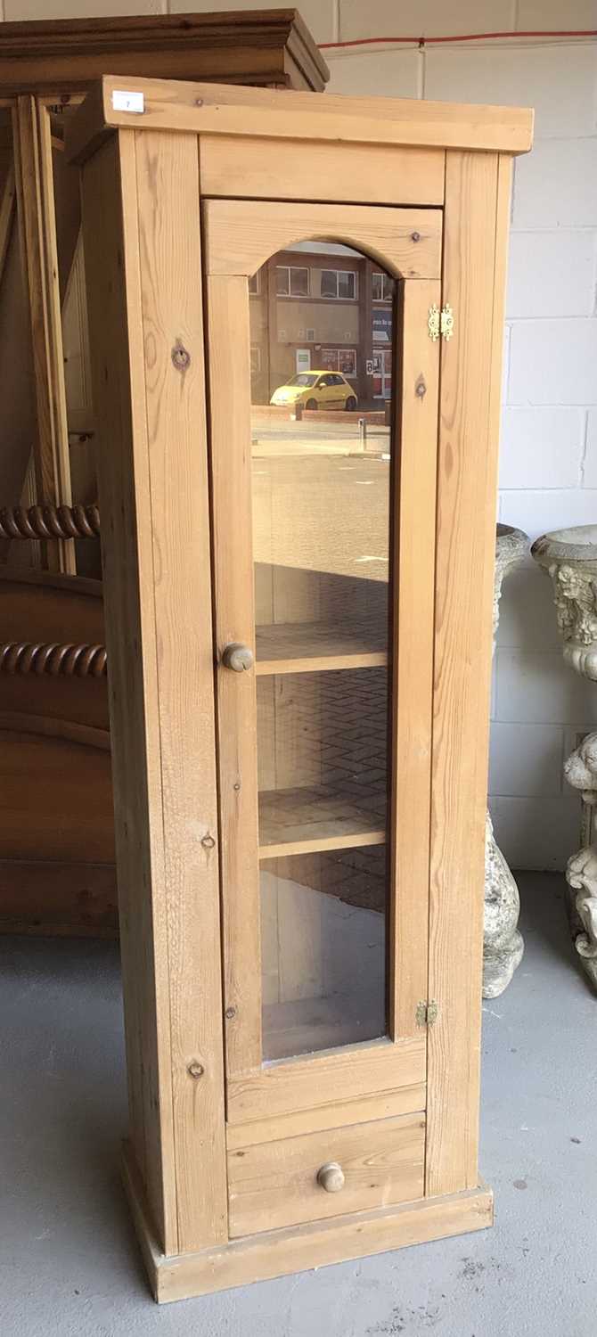 Lot 7 - Pine glazed standing cabinet