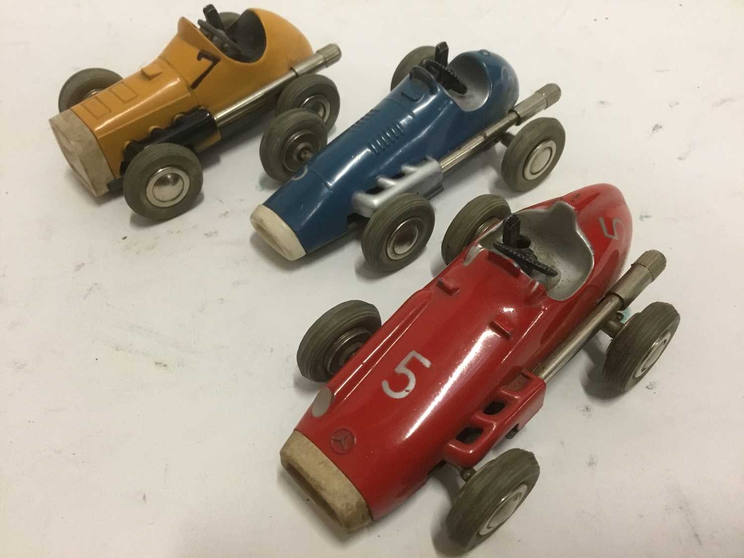 Lot 660 - 3 Schuco micro racer clockwork cars, lacking keys