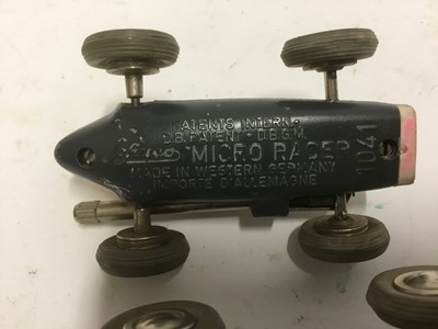 Lot 660 - 3 Schuco micro racer clockwork cars, lacking keys