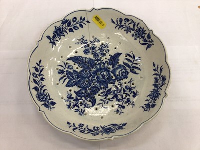 Lot 637 - 18th century blue and white Worcester porcelain drainer together with an 18th century Derby sauce boat and a similar Bow butter boat (3)