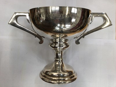 Lot 108 - Silver plated two handled trophy cup, silver plated tea and coffee set with fluted decoration and other silver plated wares