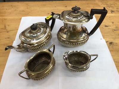 Lot 638 - Silver plated two handled trophy cup, silver plated tea and coffee set with fluted decoration and other silver plated wares