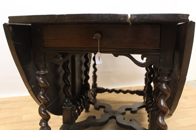 Lot 1449 - Rare 17th/18th century yew wood drop leaf dining table