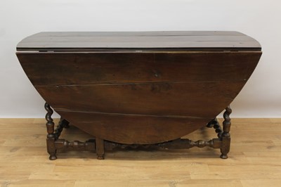 Lot 1449 - Rare 17th/18th century yew wood drop leaf dining table