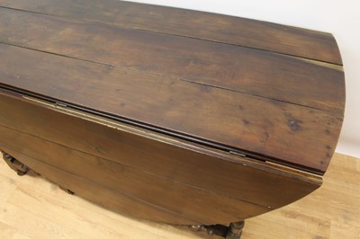 Lot 1449 - Rare 17th/18th century yew wood drop leaf dining table
