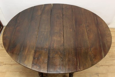 Lot 1449 - Rare 17th/18th century yew wood drop leaf dining table