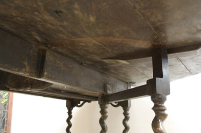 Lot 1449 - Rare 17th/18th century yew wood drop leaf dining table