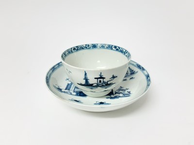 Lot 225 - A Lowestoft blue and white tea bowl and saucer, circa 1780