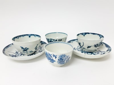 Lot 224 - Two Worcester Mansfield pattern tea bowls and saucers, circa 1770, and two other blue and white Worcester tea bowls