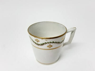 Lot 223 - An unusual Caughley bucket shaped coffee can, circa 1790, a Minton coffee can and three other coffee cans