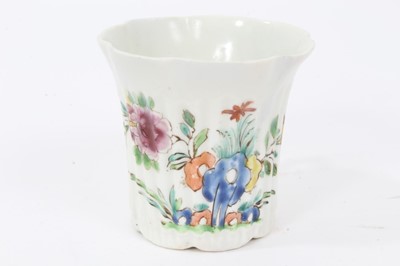 Lot 154 - An early Worcester fluted coffee can, painted in Chinese famille rose style, circa 1753-54