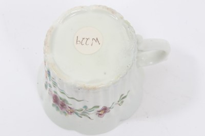 Lot 154 - An early Worcester fluted coffee can, painted in Chinese famille rose style, circa 1753-54