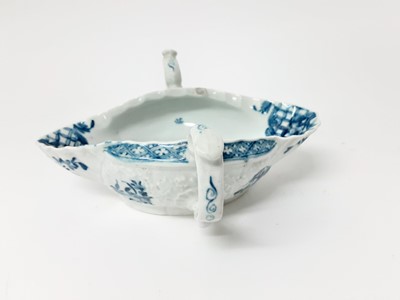 Lot 158 - A Worcester blue and white two handled sauceboat, circa 1755