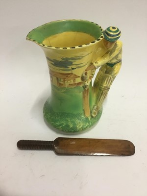 Lot 584 - Burleighware cricket themed vase together with a treen cricket bat paper knife