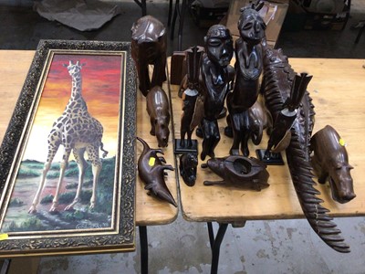 Lot 620 - Selection of carved wood African animals including Alligator, Elephant, Rhino, Hippo plus Giraffe oil on board.