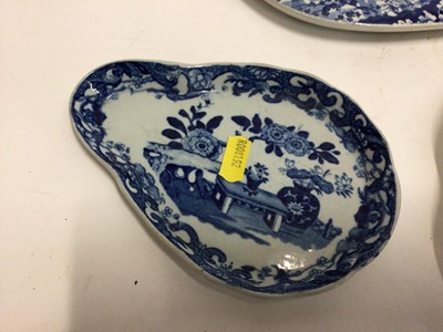 Lot 663 - Small collection of 19th century blue and white transfer ware, including a Willow pattern warming dish, a drainer printed with a rural scene, a Miles Mason teapot,  a shell-shaped dish and an irons...