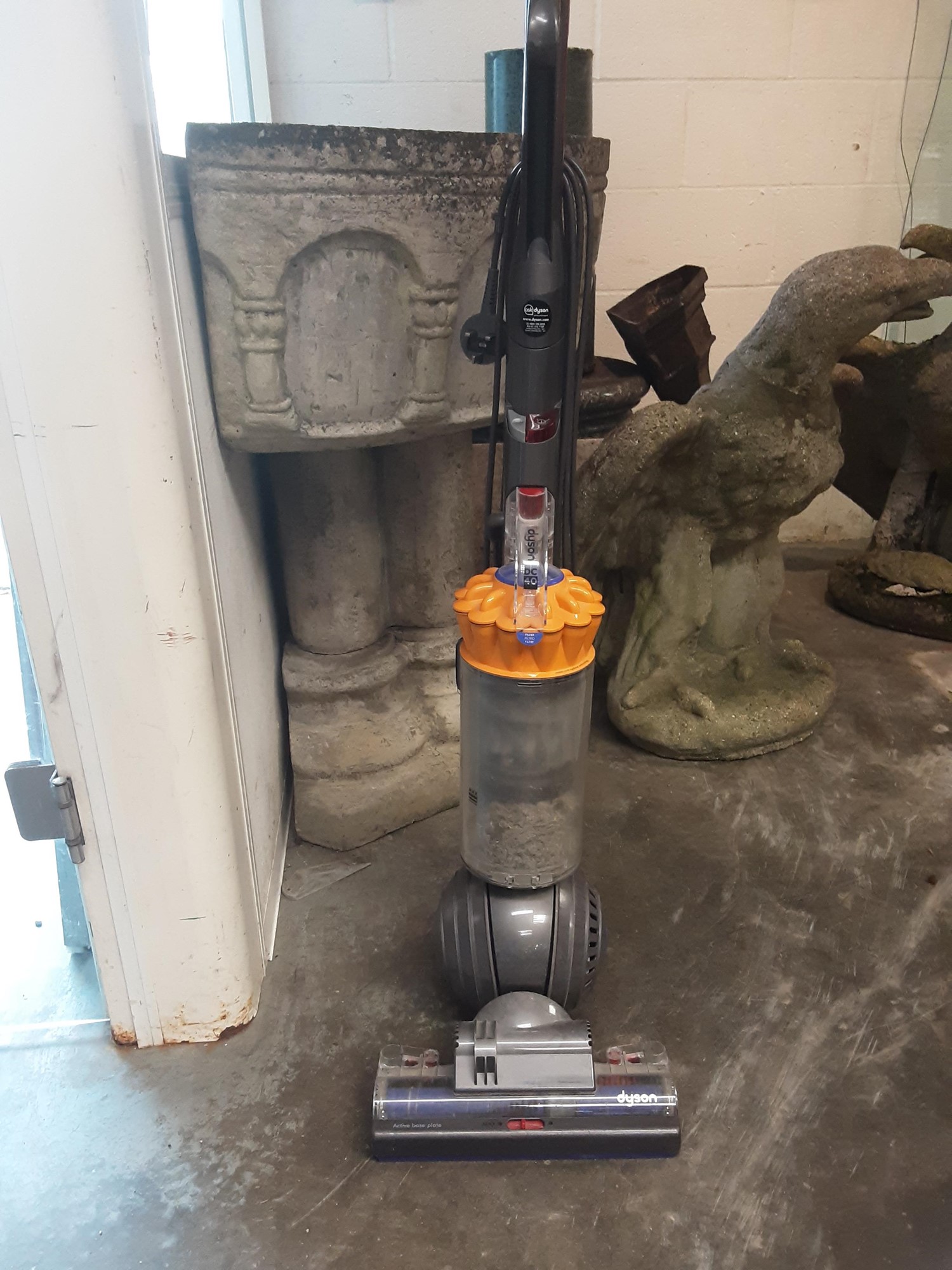 Lot 2 Dyson DC40 vacuum cleaner with paperwork