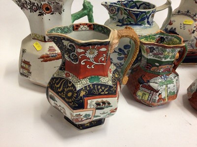 Lot 667 - Seven 19th century Masons Ironstone jugs, some with serpent handles, various patterns, sizes and marks