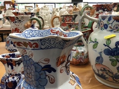 Lot 668 - Six 19th century graduated Masons Ironstone jugs, Imari patterns with serpent handles, the largest 21.5cm high