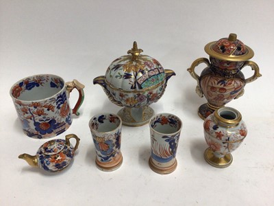 Lot 670 - Early 19th century Masons Ironstone Imari wares, including a twin handled vase, dessert tureen, mug, smaller vase, two spill vases and a miniature teapot, various marks, the large vase unmarked and...