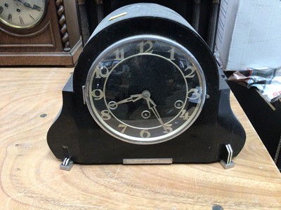 Lot 738 - Two black slate mantel clocks together with another oak cased mantel clock (3)