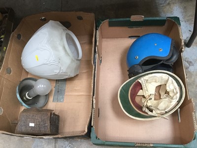 Lot 740 - Two vintage motorcycle helmets together with a white glass ceiling light