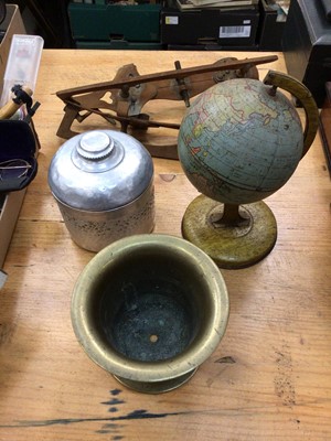 Lot 712 - Vintage tin plate globe, a Huntley and Palmers tin, a bronze mortar and a further metal object