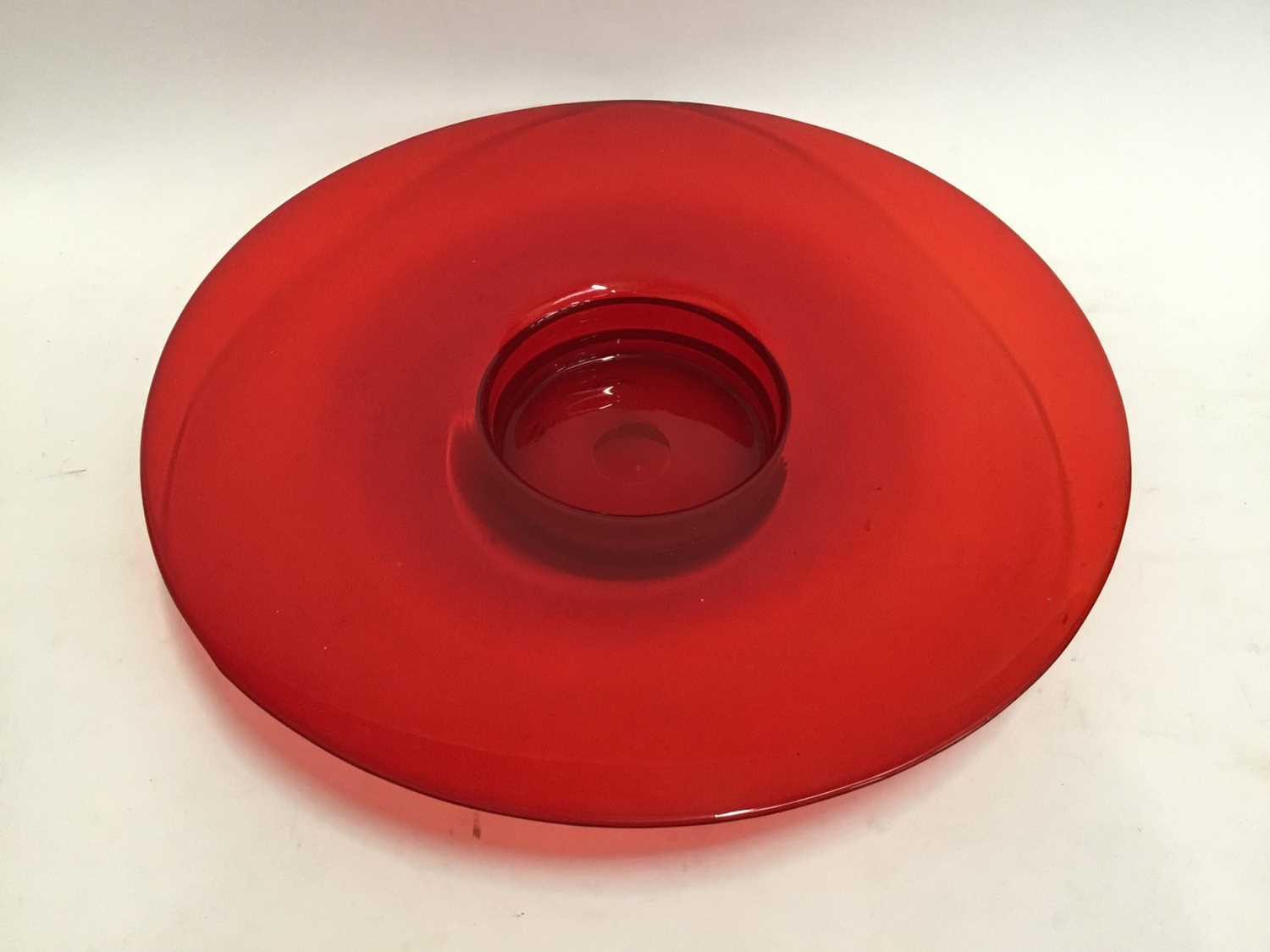 Lot 772 - Large red art glass circular bowl, 45cm diameter