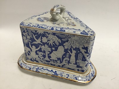 Lot 781 - Late Victorian/Edwardian blue and white cheese dish and cover of triangular form, decorated with classical scenesc