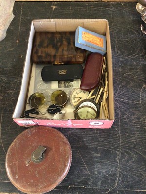 Lot 780 - Vintage sunglasses, desk clock movements, whist marker, leather covered measuring tapes and sundries