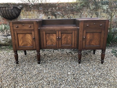 Lot 27 - William IV mahogany sideboard with sunk centre and an arrangement of two drawers and four cupboards, on turned and fluted tapered legs, 192cm wide x 60cm deep x 94cm high
