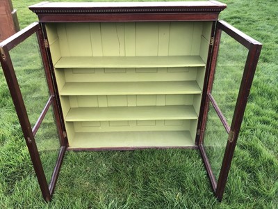 Lot 29 - Georgian mahogany bookcase with dentil cornice, twin glazed doors enclosing adjustable shelves with green painted interior, 124cm wide x 119cm high x 30cm deep