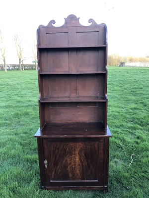 Lot 31 - 19th century mahogany and grained waterfall bookcase with scrolling top rail and graduated open shelves, enclosed panel cupboard below, on tapering legs, 78cm wide x 38cm deep x 190cm high