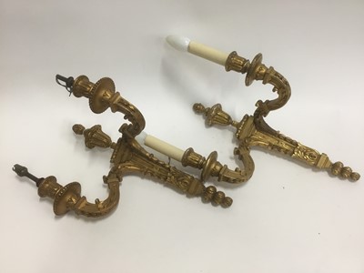 Lot 867 - Group of six 1920s Adam-style giltwood twin branch wall lights