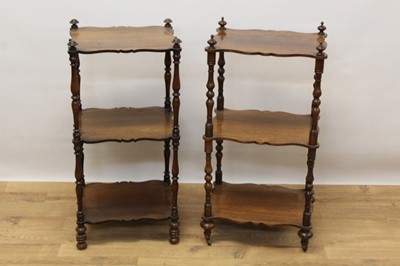 Lot 1395 - Near pair of Victorian rosewood three tier what-nots with turned supports