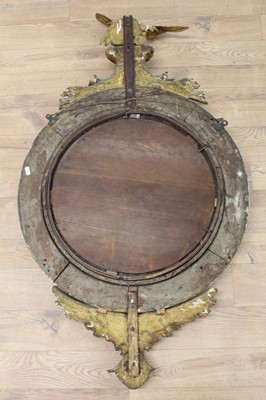 Lot 1393 - Regency gilt framed convex wall mirror with eagle surmount