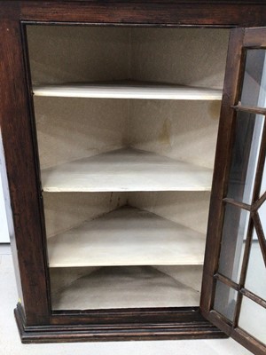 Lot 43 - 19th century stained pine corner cupboard with glazed doors enclosing shelves, 76cm wide x 97cm high