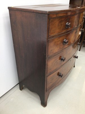 Lot 46 - Georgian mahogany bow front chest of tow short and three long drawers with bun handles, on splayed bracket feet, 104cm wide x 50cm deep x 105cm high