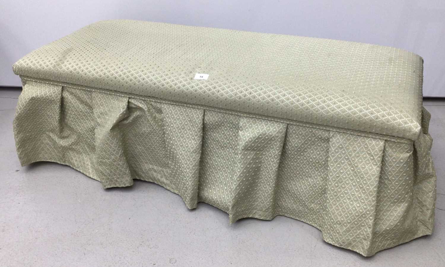 Lot 54 - Edwardian rectangular ottoman with rising lid, on mahogany bun feet, with green patterned upholstery, 120cm wide x 46cm deep x 39cm high