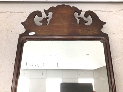 Lot 129 - 19th century mahogany framed wall mirror in the Chippendale style with scroll cresting, 89cm high x 39cm