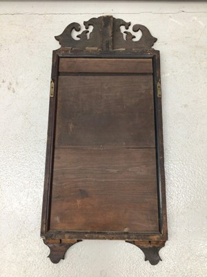Lot 129 - 19th century mahogany framed wall mirror in the Chippendale style with scroll cresting, 89cm high x 39cm