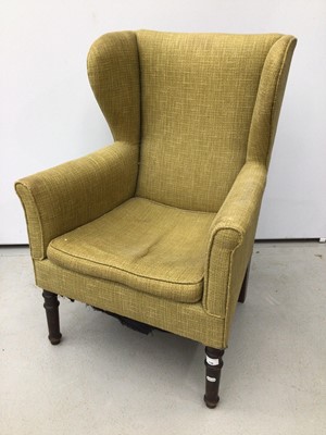 Lot 130 - Edwardian wing arm chair of small proportions on turned mahogany legs