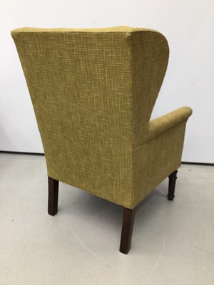 Lot 130 - Edwardian wing arm chair of small proportions on turned mahogany legs