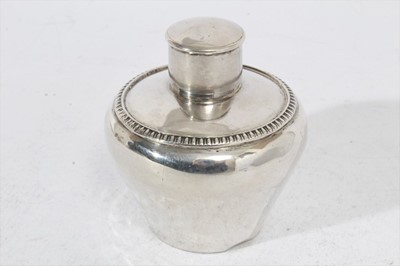 Lot 312 - Edwardian silver tea caddy of tapered form with gadrooned border and slip on cover, (Birmingham 1906), maker Henry Bushell & Co, 7oz. 10cm in overall height