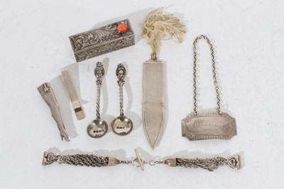 Lot 319 - Elizabeth II silver bookmark with engine turned decoration (Birmingham 1953), together with a Continental silver lipstick case, stamped 800, two silver tie clips, a silver Brandy label, two silver...